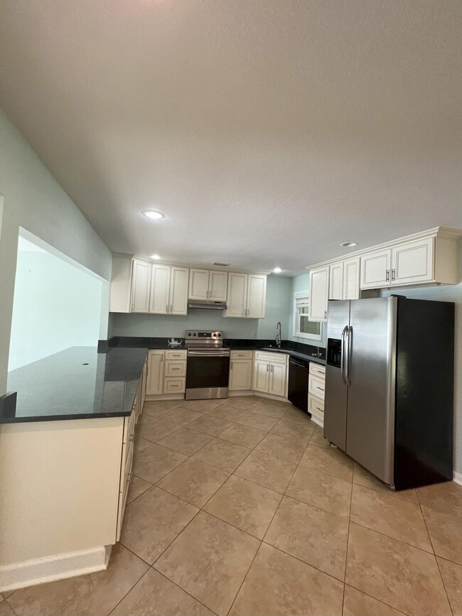 Building Photo - 1207 Sunshine Dr