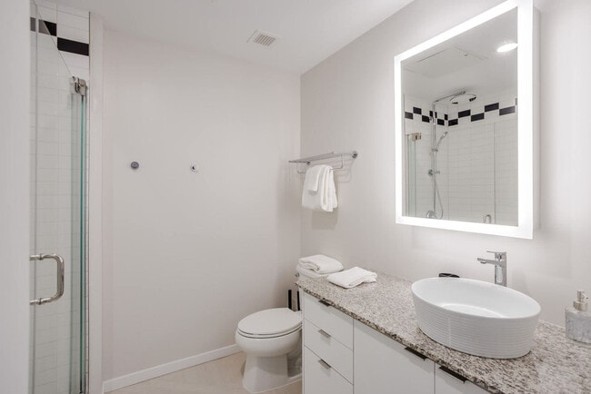 Building Photo - 9-JAN-JAN E 4th St