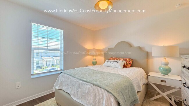 Building Photo - EXCEPTIONAL AND SPACIOUS FURNISHED TOWNHOME WITHIN WATERSIDE- NAUTIQUE!