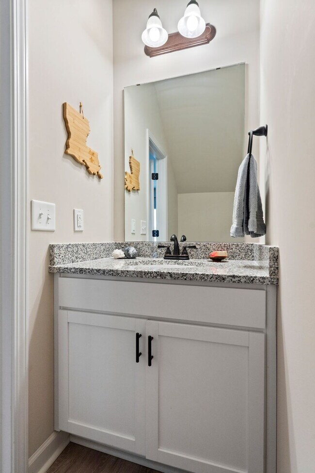 Building Photo - Available Now! Enjoy low-maintenance coastal living in this beautiful 2-bedroom, 2.5-bath townhom...