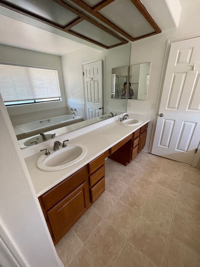 Building Photo - Quaint Gated Community near Pacific View Mall