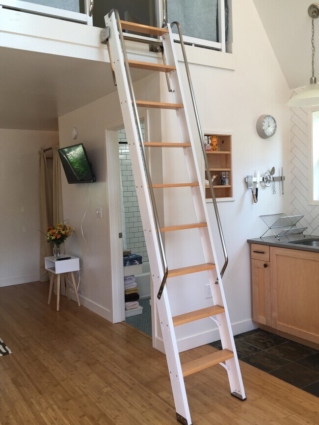 ladder leads to loft bedroom - 1824 NE 169th St