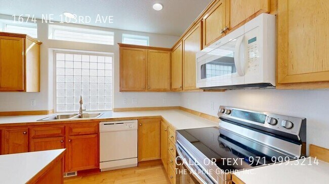 Building Photo - 1674 NE 103rd Ave