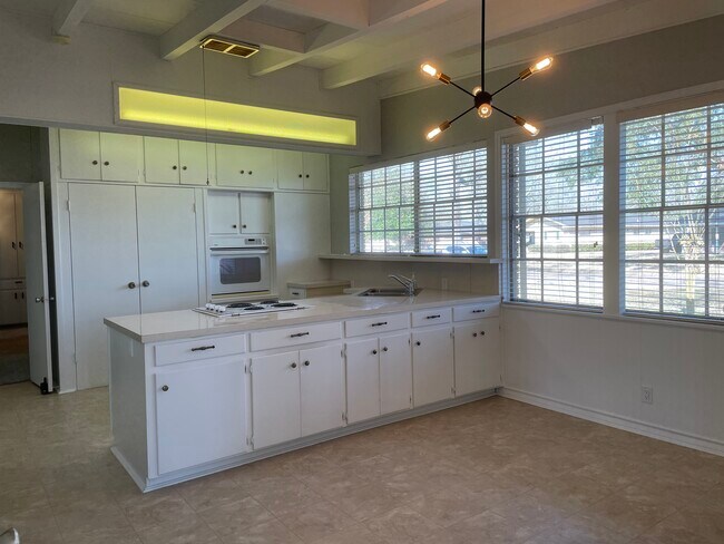 Large, bright eat-in kitchen with loads of storage - 1925 Driskill St