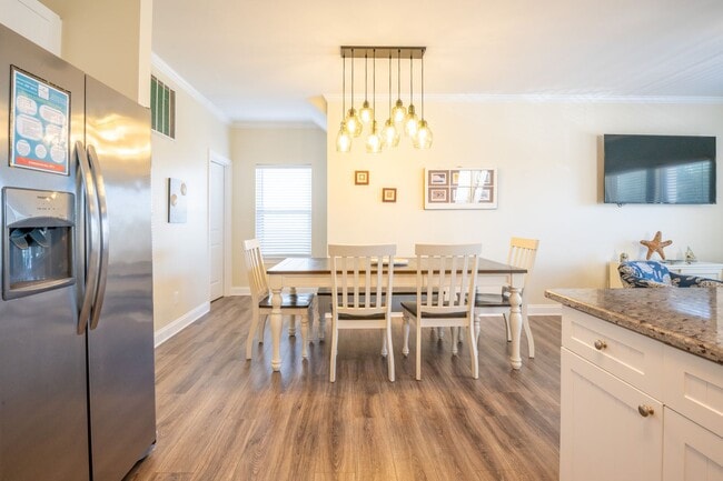 Building Photo - PRICE REDUCTION! LIVE AT THE BEACH FOR THE...