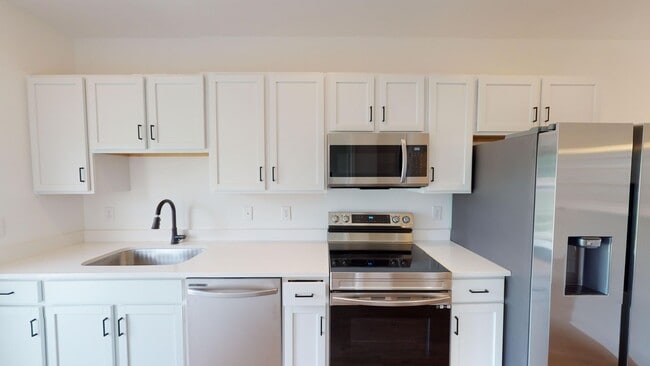 Building Photo - Comfort & Style – Beautiful 2-Bedroom Town...