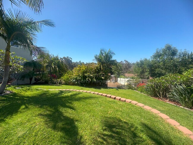 Building Photo - Spacious 4-Bedroom Home on Expansive Lot i...