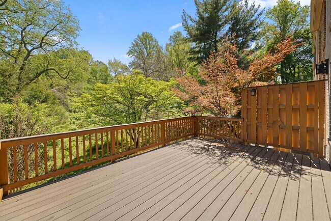 Building Photo - Completely Renovated Corner Townhome with Modern Kitchen, Designer Baths, and Private Yard