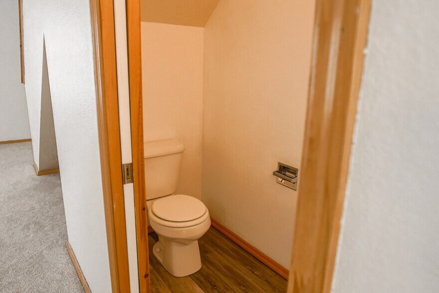 Downstairs half bath - 414 W Babcock St, Unit 1