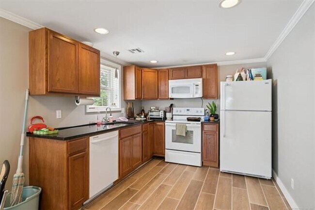 Building Photo - Gorgeous updated and modern open layout