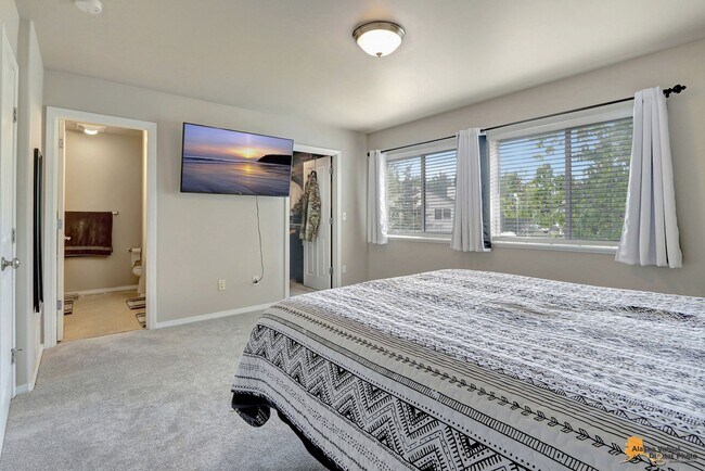 Building Photo - East Anchorage Home with Utilities Included!! Close to JBER! Attached Two Car Garage + Fenced in ...