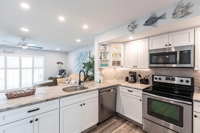 Building Photo - 6154 Midnight Pass Rd