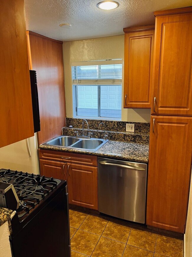 Building Photo - 10635 Sherman Grove Ave