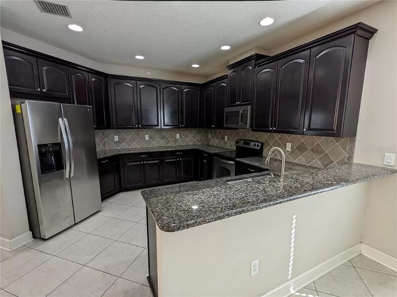 Building Photo - 16044 Bella Woods Dr