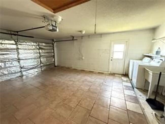 Building Photo - Charming 3-bed, 2-bath POOL home with 2-car garage. Features ceramic tile flooring, updated kitch...