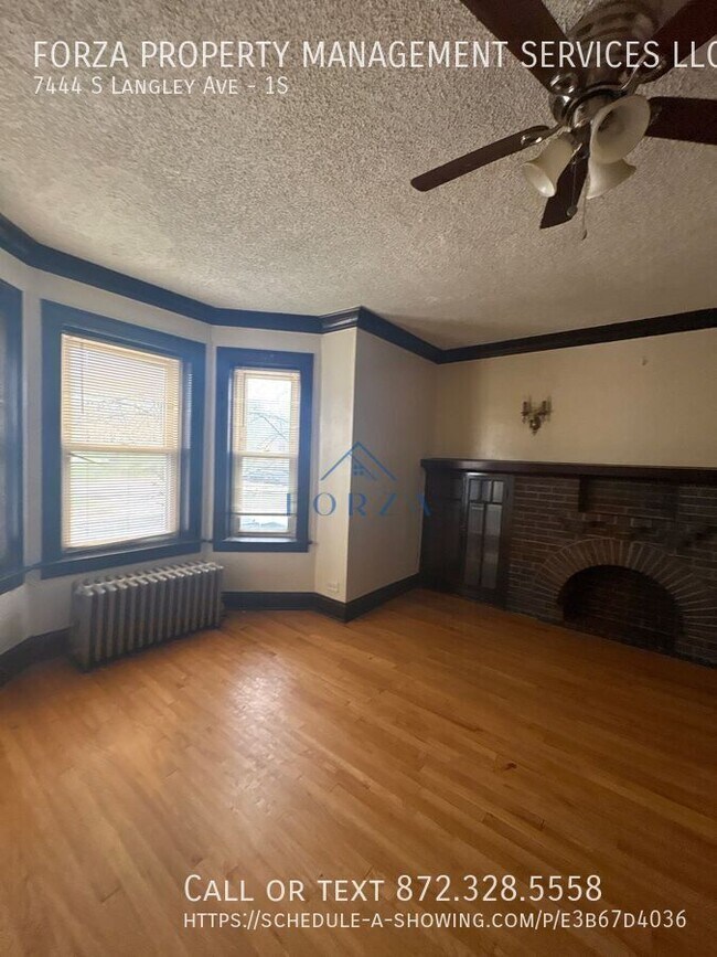 Building Photo - 7444 S Langley Ave
