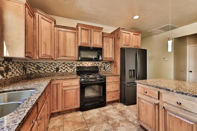 Building Photo - "Spacious 4-Bedroom Retreat with 3,584 Sq ...