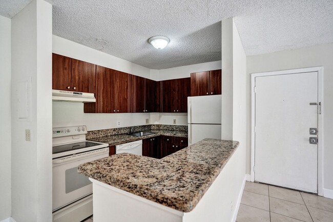 Building Photo - Updated 2 Bed, 2 Bath 1st Floor Condo with...