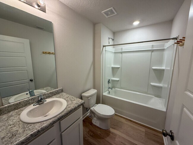 Building Photo - Updated 4 Bedroom 2 Bath Rental Near Navy Federal - Lawn Care Included!