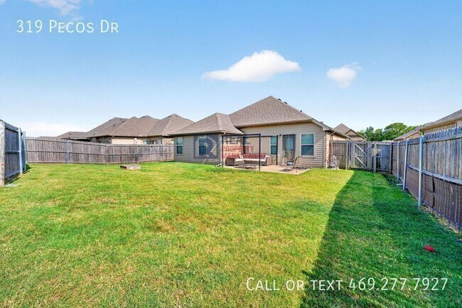 Building Photo - 319 Pecos Dr