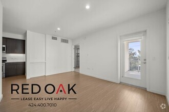Building Photo - ~1 Month FREE~ Spacious and Bright Two Bed...