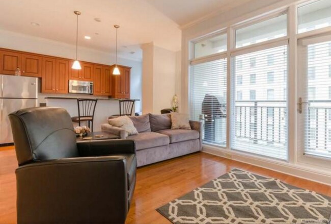 Living Room with WiFi plugs - 230 S Tryon St