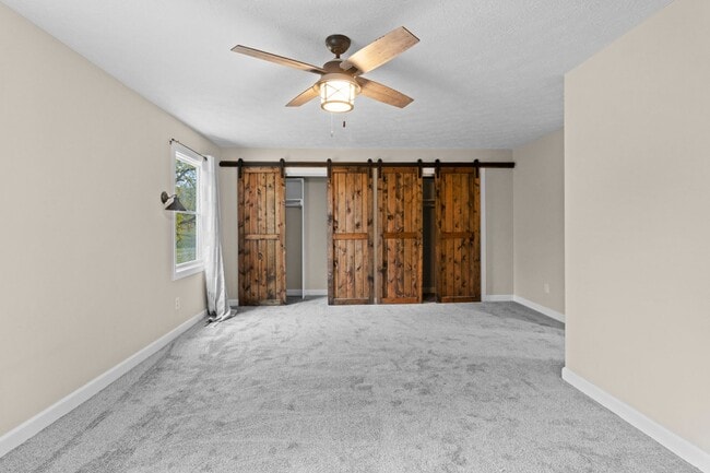 Building Photo - AVAILABLE NOW! Waterfront Living in Carmel! Paddle boat included!