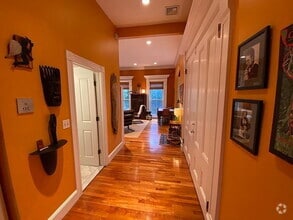 Building Photo - "Charming 2-Bed Haven with Gleaming Hardwo...
