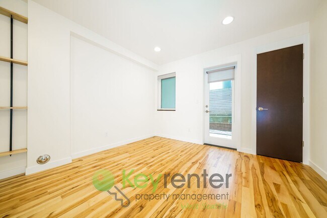 Building Photo - **Rent Special** Modern Two Bedroom Townhome with Designated Parking