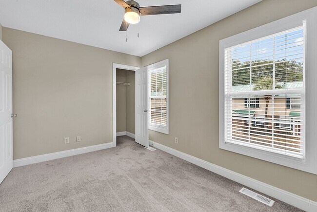Building Photo - Where your commute is shorter than the Starbucks drive-thru line on 501. Grab the keys before som...