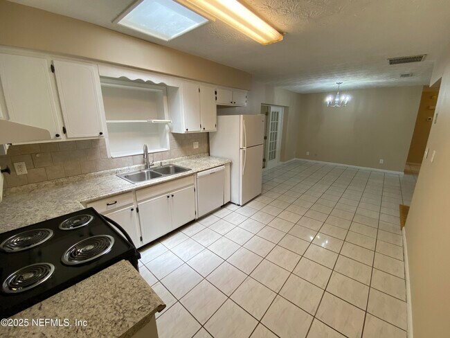 Building Photo - 4581 Praver Dr N