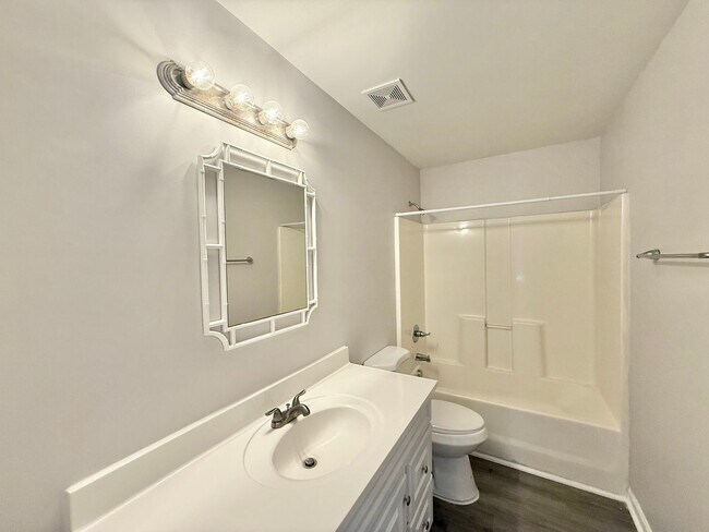 Building Photo - Updated 4BD, 2.5BA Raleigh Home With Easy ...