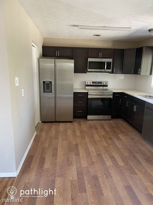 Building Photo - 4 br, 2 bath House - 1220 Garcia St NE UNIT