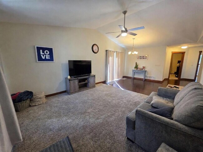 Building Photo - FREE SEPTEMBER RENT for this Spacious 4-Bedroom Home with Vaulted Ceilings with Finished Basement...