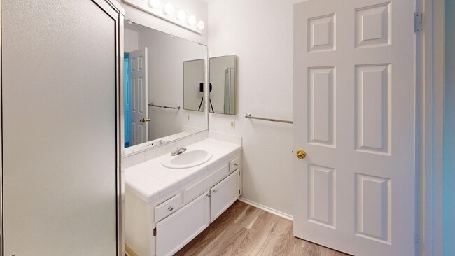 Building Photo - Update 2x2 Top Floor Condo with pool, storage, fireplace & garage in ideal Novato Location
