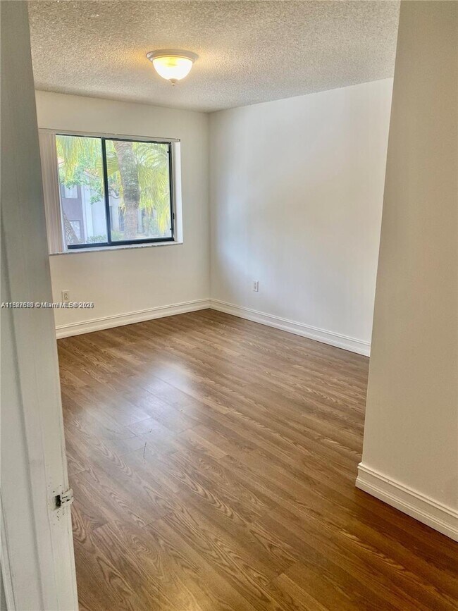 Building Photo - 8323 Coral Lake Dr