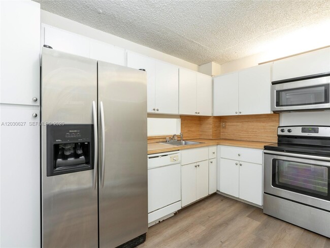 Building Photo - 6450 Collins Ave