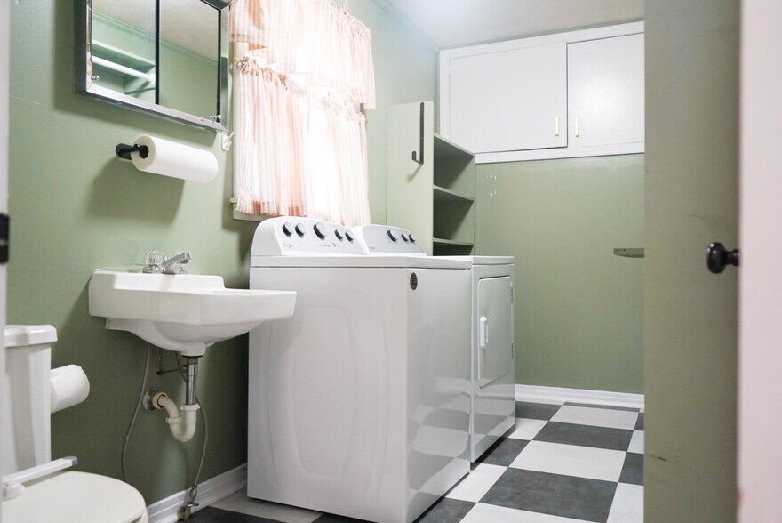 Laundry room - has a half bathroom - 735 Fisk Rd
