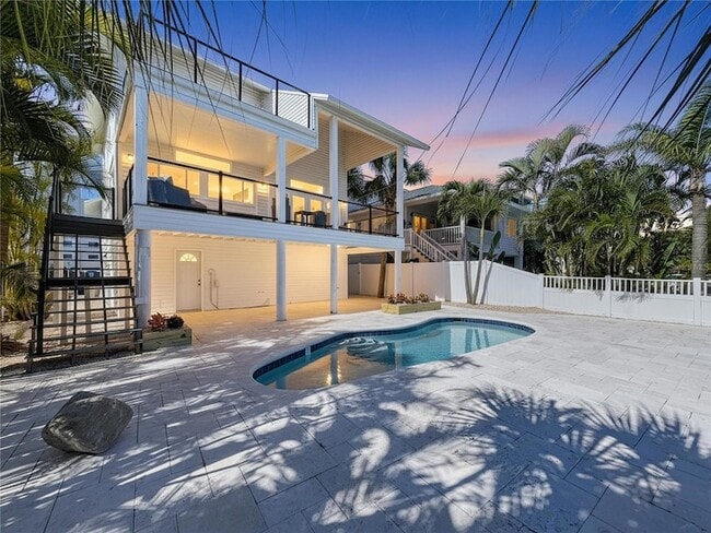 Building Photo - 8485 Blind Pass Dr