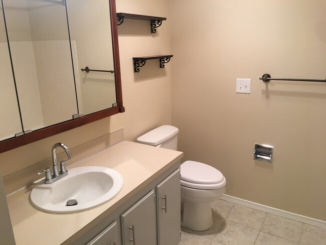 Full bathroom, tiled floor - 19411 56th Ave W