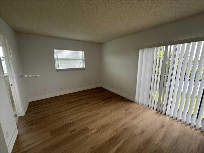 Building Photo - 8560 N Sherman Cir
