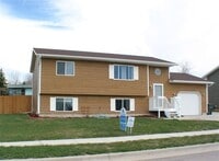 Building Photo - 4 BED | 2 BATH | SINGLE GARAGE | RAPID VALLEY