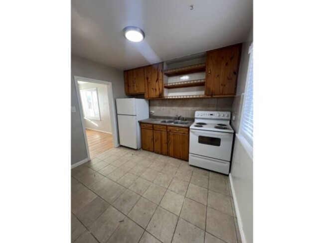 Building Photo - SECTION 8 WELCOME!! Three bedroom two bath...