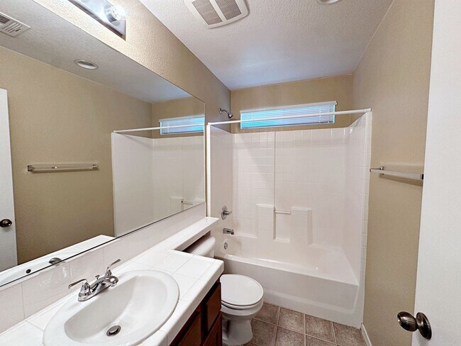 Building Photo - Spacious 3-Bedroom Home in Gated Community with Pool & Private Backyard