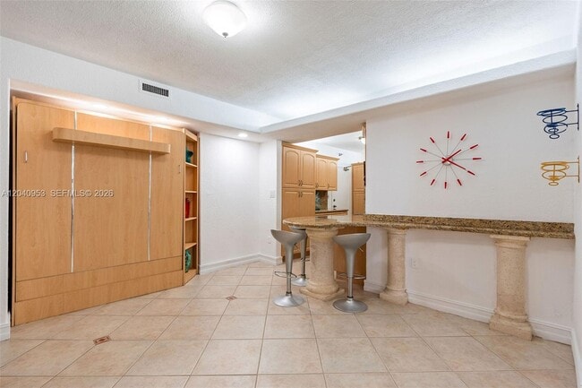 Building Photo - 10185 Collins Ave