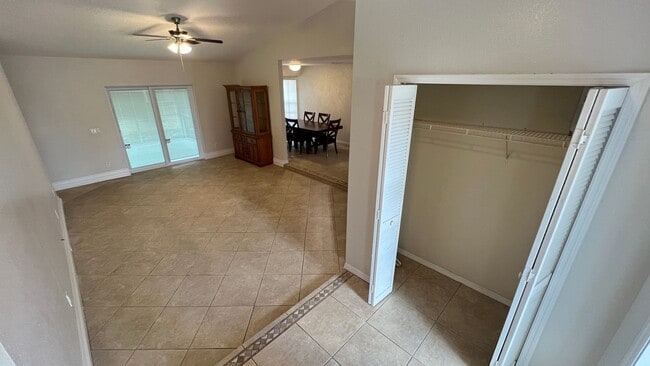 Building Photo - Bright & Spacious 3/2 Home with Huge Yard + Screened Patio — Lawn Care Included!