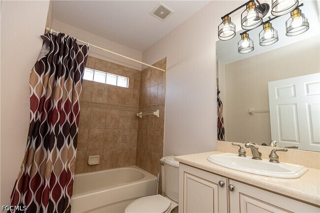 Building Photo - 8789 Paseo De Valencia St