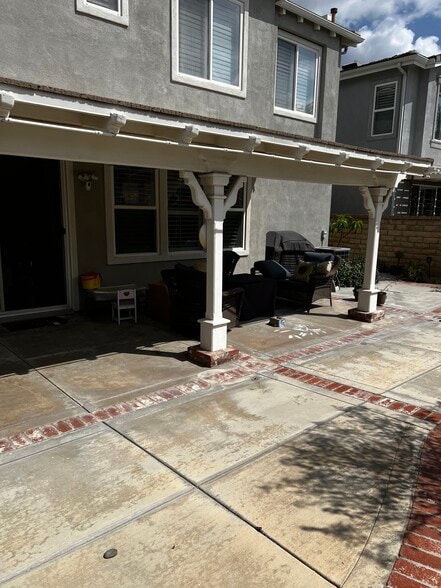 Patio in backyard - 24040 Dandelion Ln