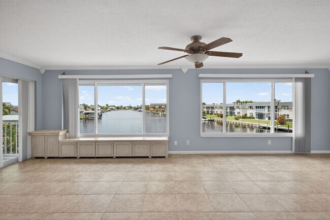 Building Photo - Gulf Access 2 bedroom 2 Bath Fully updated Condo with Water View