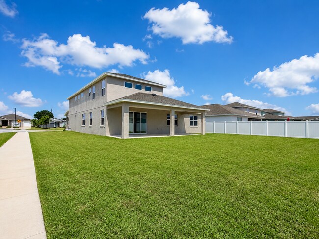 Building Photo - Experience modern & expansive living in this corner-lot 5Bedrooms/3.5Bath home at Ocala!